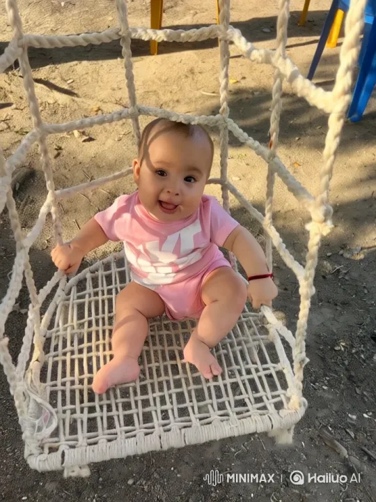 Baby's Joyful Dance in Outdoor Swing Setting – AI Generated Video | Hailuo AI