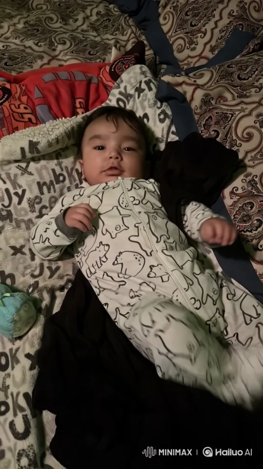 Baby's Gentle Dance in Cozy Animal-Print Onesie – AI Generated Video | Hailuo AI
