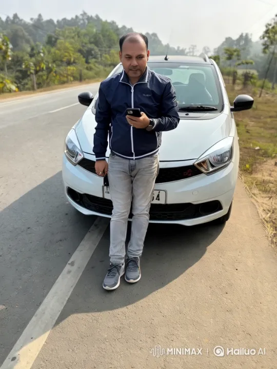 Man with Phone and Object by White Car on Scenic Road – AI Generated Video | Hailuo AI