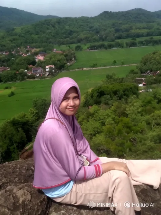 Woman in Hijab Overlooks Lush Valley with Tracking Shot – AI Generated Video | Hailuo AI