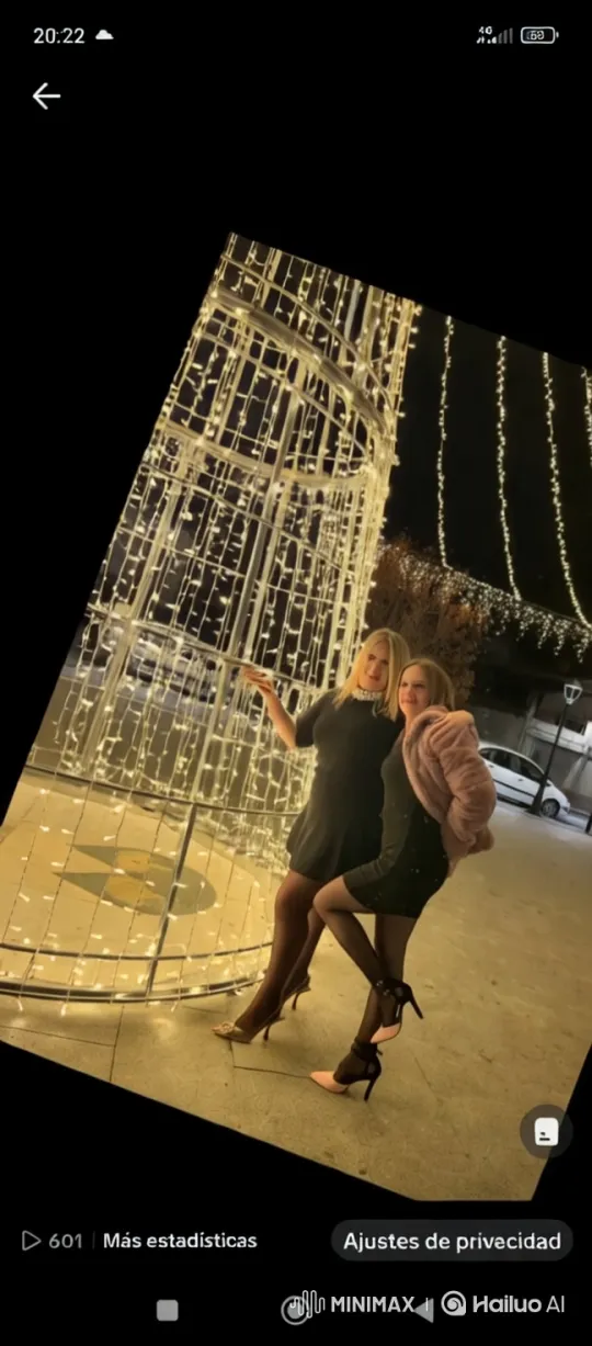 Elegant Women Dance Energetically in Front of Illuminated Structure – AI Generated Video | Hailuo AI