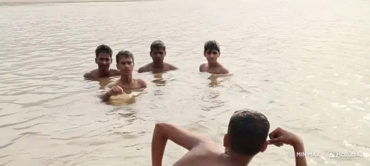 Boys Swim Towards Boat in Pacific in Live2D Animation – AI Generated Video | Hailuo AI