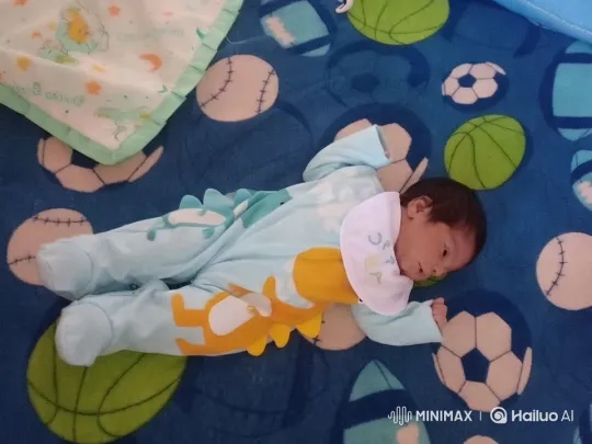 Baby on Playful Sports Ball Blanket - Aesthetic Focus – AI Generated Video | Hailuo AI