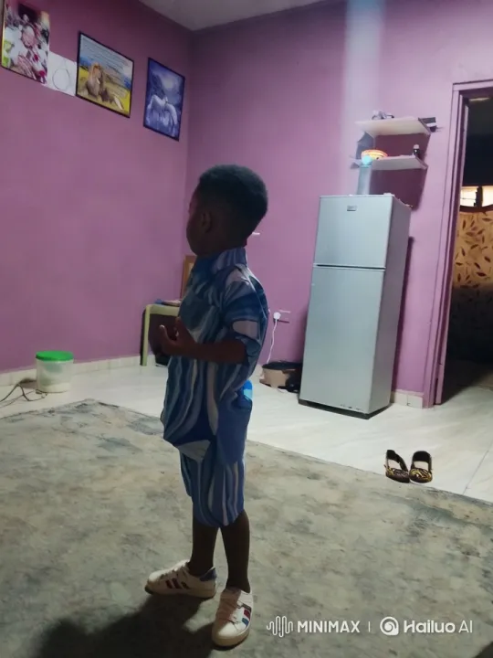 Energetic Boy Runs Enthusiastically in Colorful Room – AI Generated Video | Hailuo AI