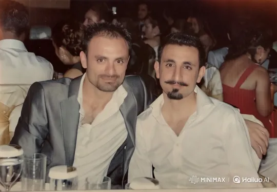 Formal Event: Men Share Heartfelt Hug in Slow Motion – AI Generated Video | Hailuo AI