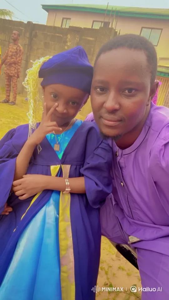 Graduation Ceremony: Focus on Child and Adult in Graduation Attire – AI Generated Video | Hailuo AI