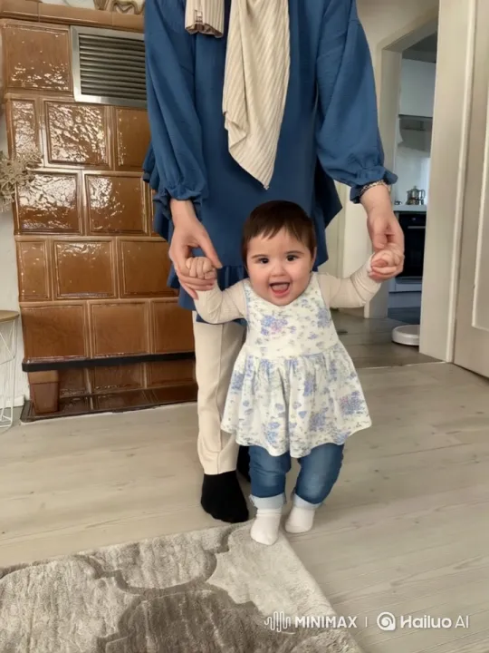 Toddler's Joyful Jumps with Adult Support – AI Generated Video | Hailuo AI