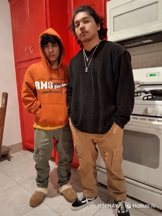 Two Young Men in a Kitchen, Captured in Colorful, Dynamic Scene – AI Generated Video | Hailuo AI