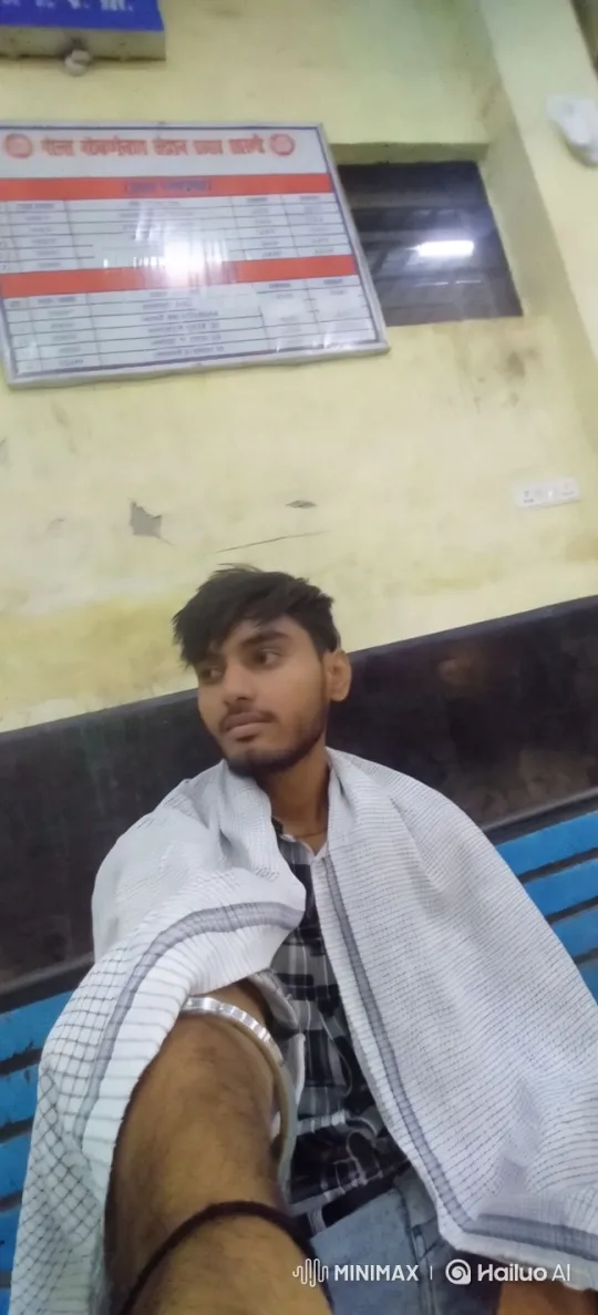 Young Man Reflects on a Bench in a Quiet Waiting Area – AI Generated Video | Hailuo AI