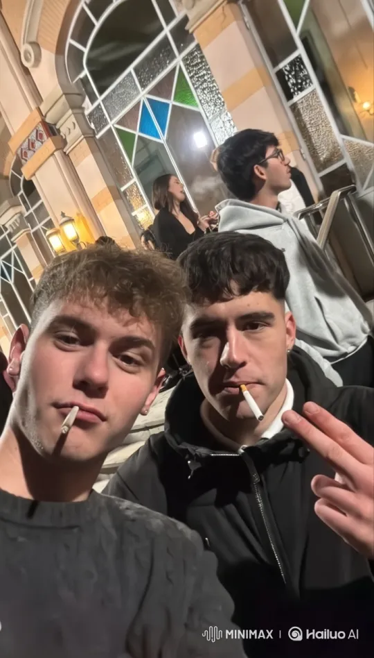 Young Men Share Moment of Intimacy Outside Stained Glass Building – AI Generated Video | Hailuo AI
