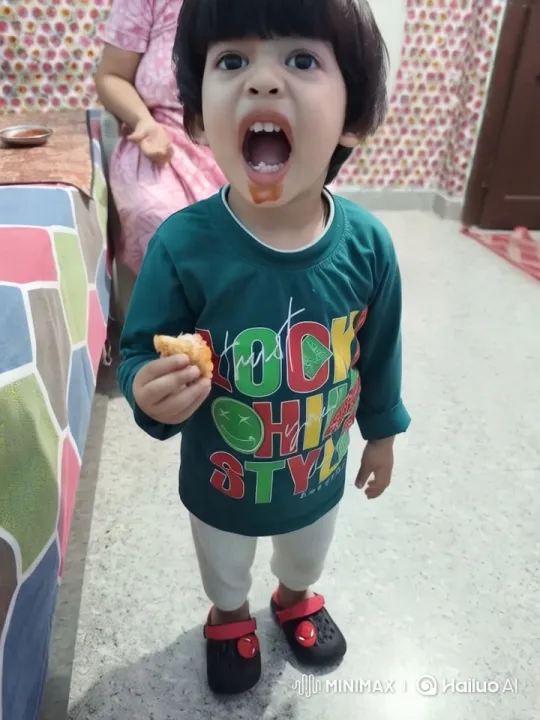 Child Enjoying Food in Colorful, Playful Setting – AI Generated Video | Hailuo AI