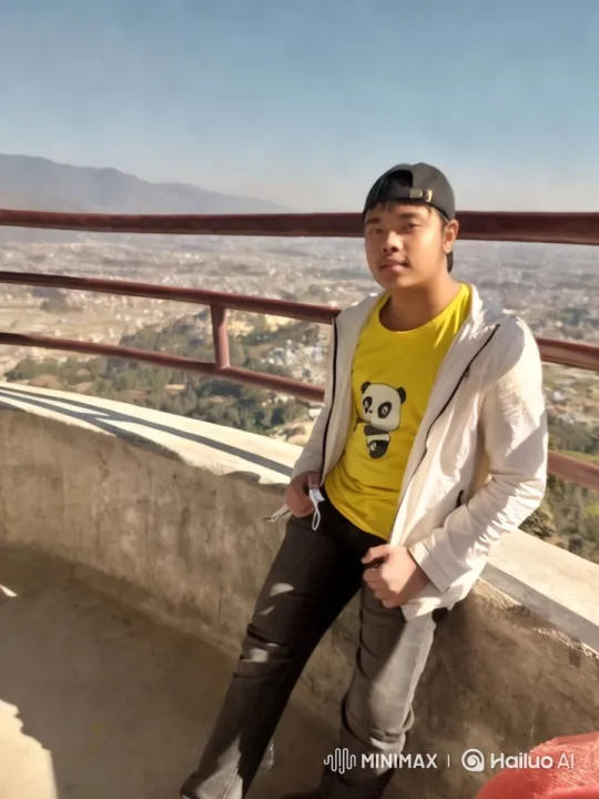 Young Man on Balcony Overlooking Cityscape – AI Generated Video | Hailuo AI