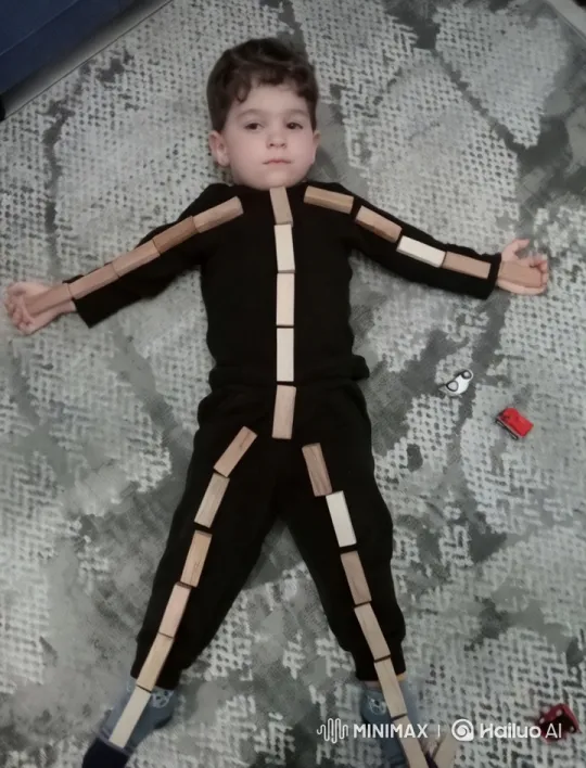 Child with Wooden Blocks on Carpet - Aesthetic Playful Scene – AI Generated Video | Hailuo AI