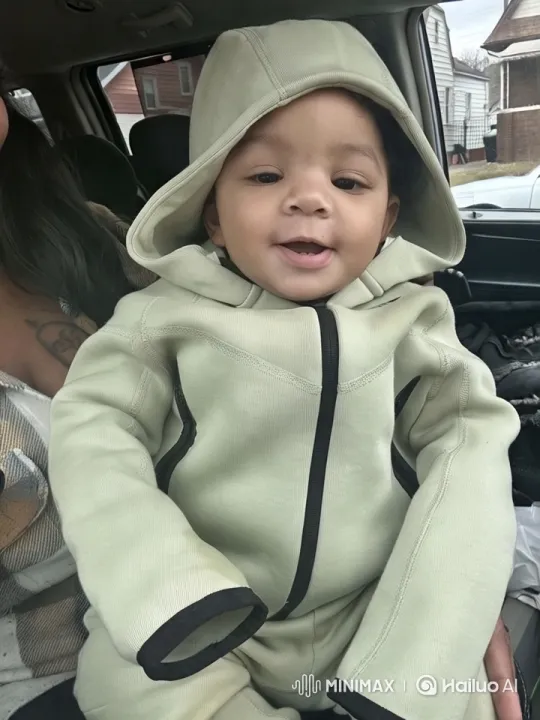 Baby on Lap: A Heartwarming Moment in a Car – AI Generated Video | Hailuo AI