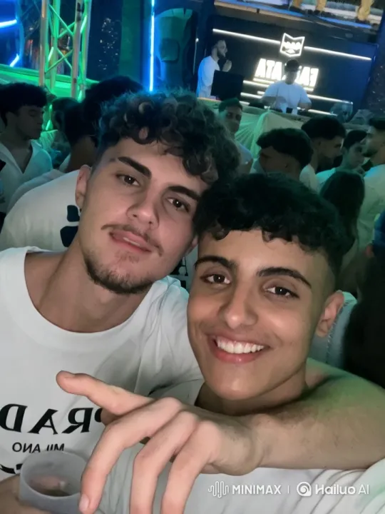 Lively Party Scene with Intimate Kiss Moment – AI Generated Video | Hailuo AI