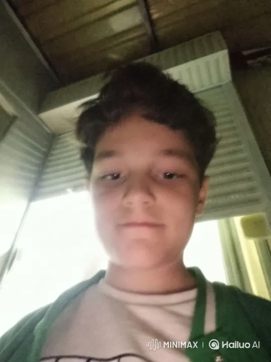 Contemplative Boy in Industrial Setting – AI Generated Video | Hailuo AI