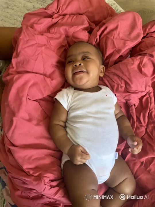 Baby's Joyful Dance on Pink Blanket – AI Generated Video | Hailuo AI