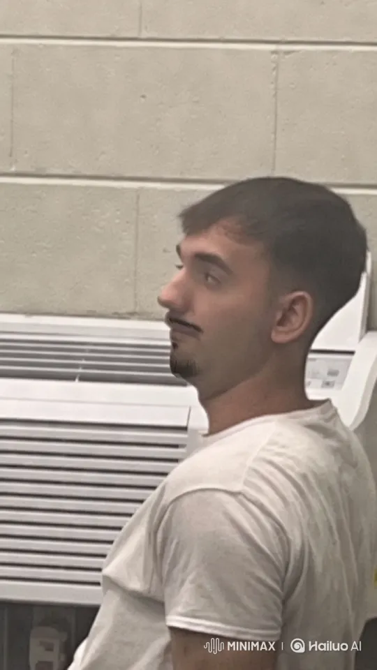 Man's Anger in White-Walled Room Captured on Camera – AI Generated Video | Hailuo AI