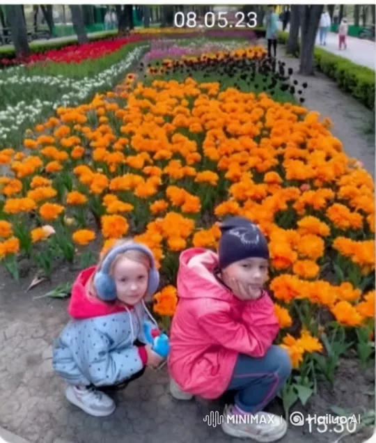 Children Exploring Vibrant Garden with Colorful Flowers – AI Generated Video | Hailuo AI