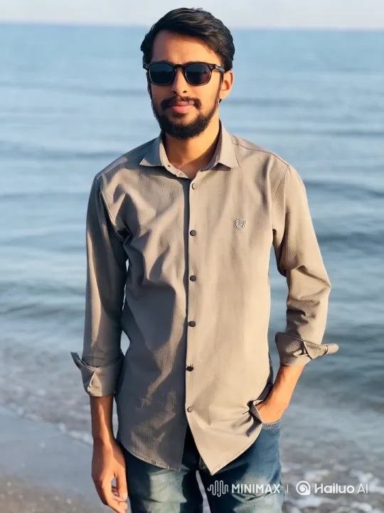 Young Man on Beach Showcases Tranquility and Aesthetic – AI Generated Video | Hailuo AI