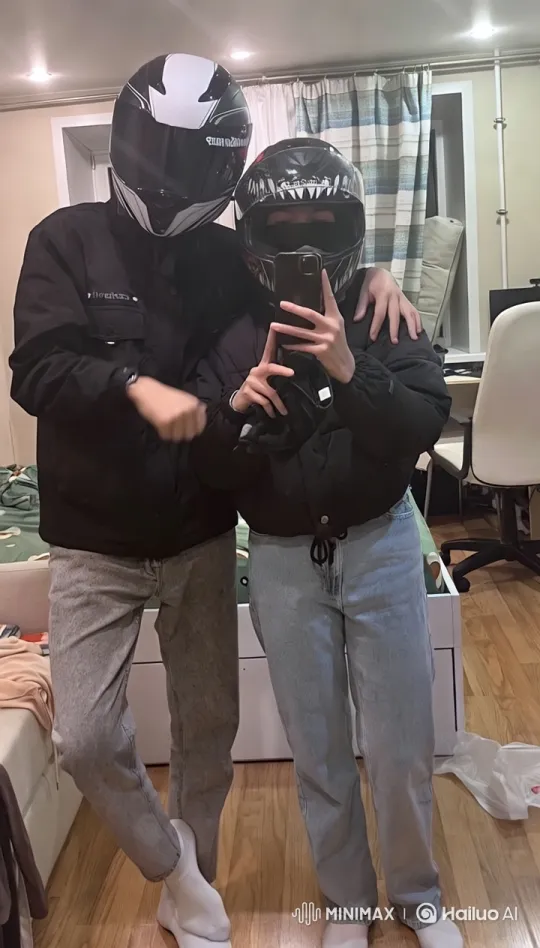 Cozy Room with Two Individuals in Motorcycle Helmets – AI Generated Video | Hailuo AI