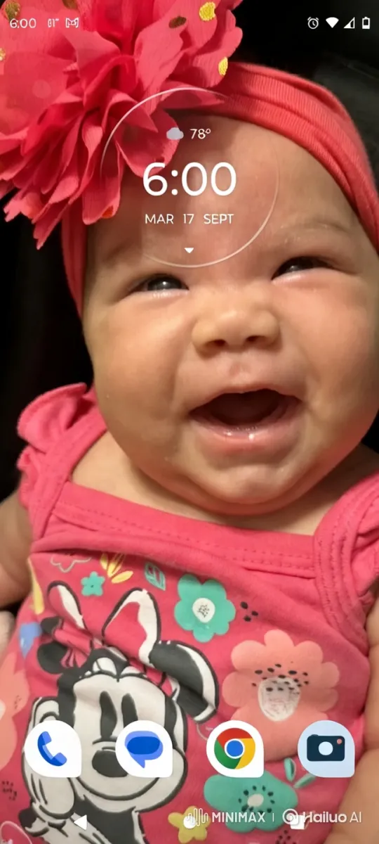 Joyful Baby in Vibrant Outfit with Warm Lighting – AI Generated Video | Hailuo AI