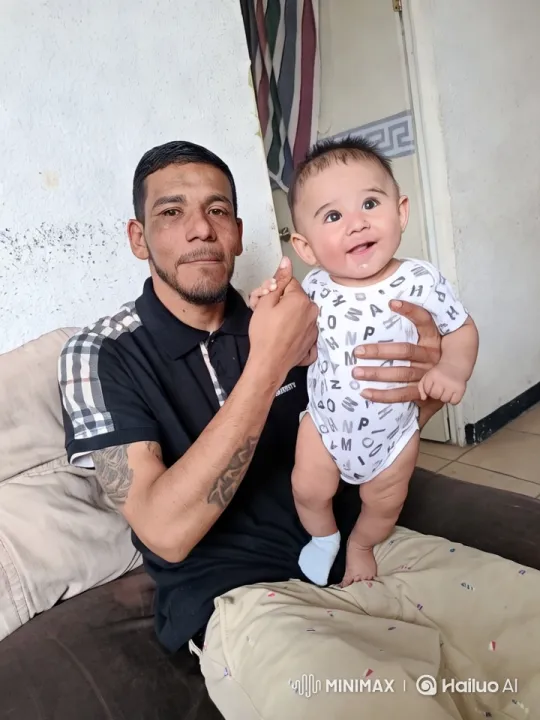 Man Dances Reggaeton with Baby on Lap – AI Generated Video | Hailuo AI