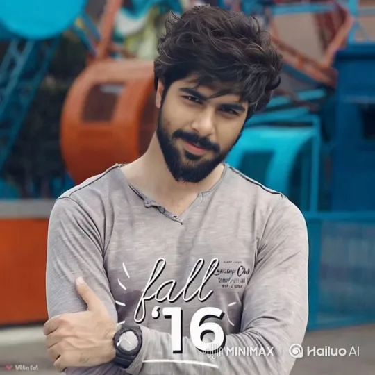 Young Man Poses for Photo in Colorful 'Fall '16' Shirt – AI Generated Video | Hailuo AI