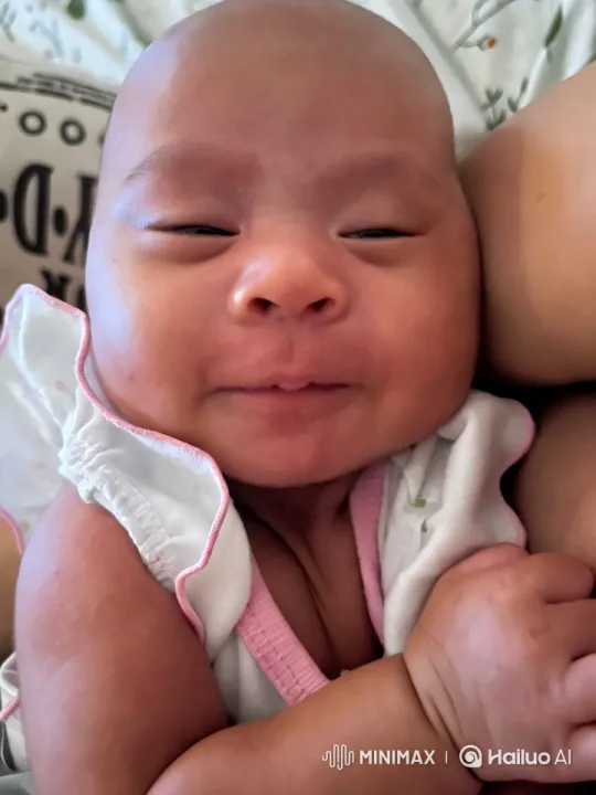 Joyful Baby Dancing on Floral Blanket – AI Generated Video | Hailuo AI