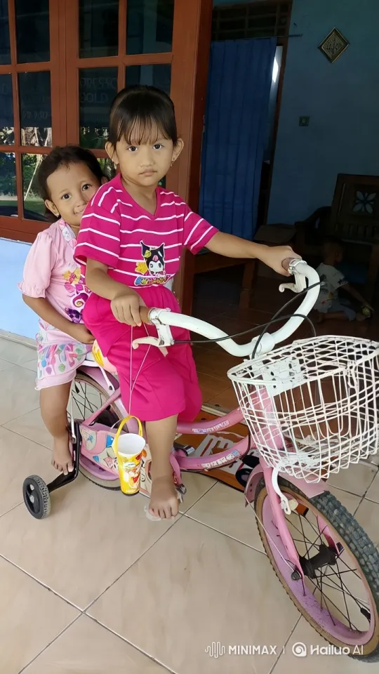 Children Enjoying a Ride on a Pink Bicycle – AI Generated Video | Hailuo AI