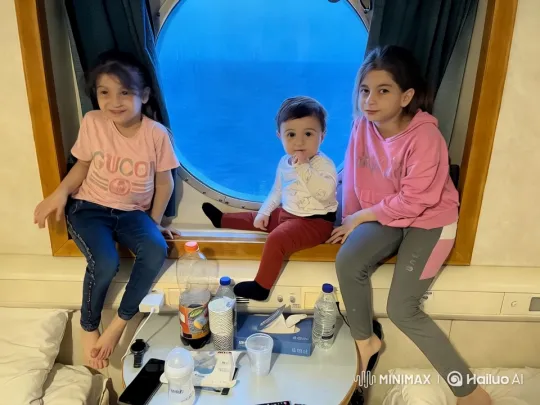 Children Leap from Window Ledge in Playful, Colorful Scene – AI Generated Video | Hailuo AI