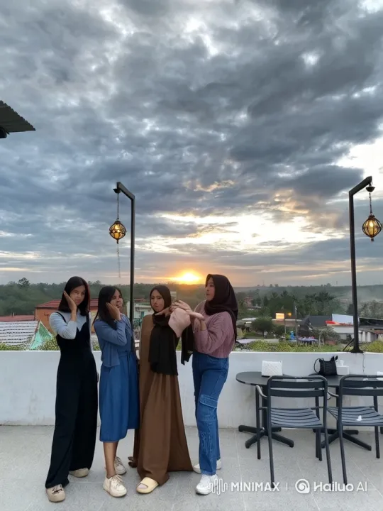 Four Women Enjoying Sunset on Rooftop Terrace – AI Generated Video | Hailuo AI