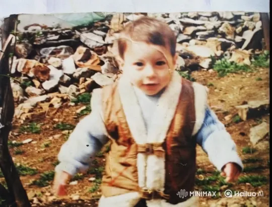 Child in Brown Vest Amidst Rustic Outdoor Scenery – AI Generated Video | Hailuo AI