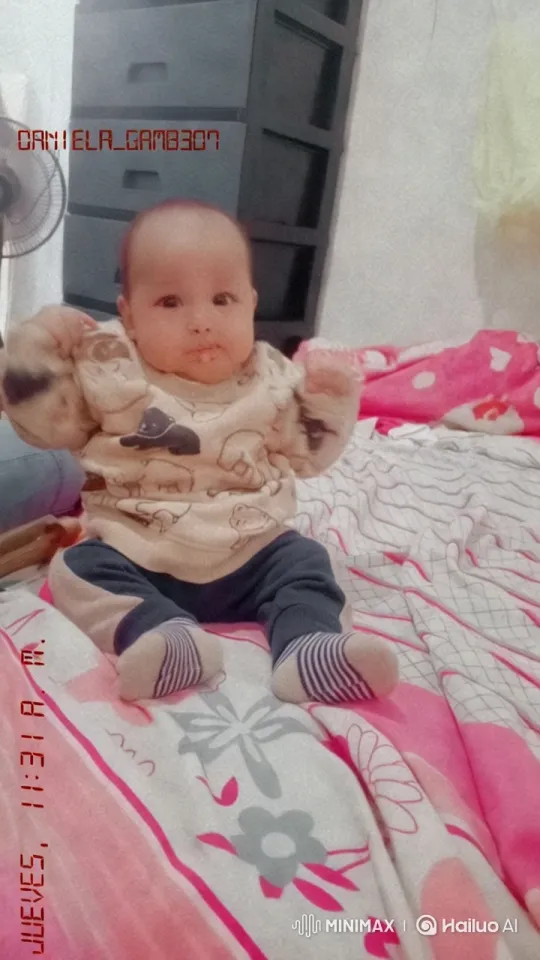 Baby's Playful Kung Fu Dance on Floral Blanket – AI Generated Video | Hailuo AI