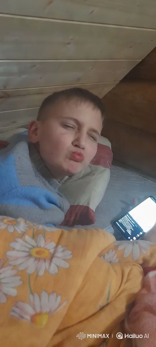 Cozy Cabin: Person Resting with Text on Phone – AI Generated Video | Hailuo AI