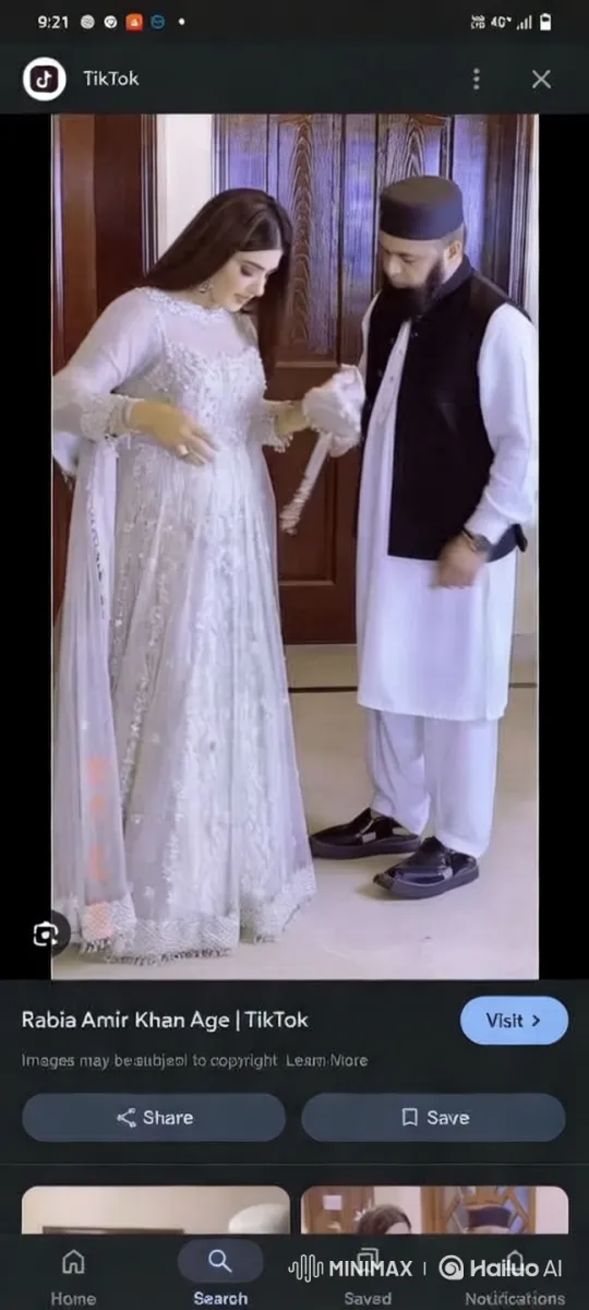 Couple in Traditional Attire by Wooden Door – AI Generated Video | Hailuo AI
