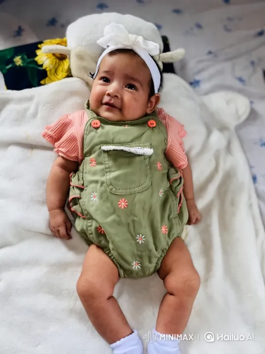 Baby Dancing in Green Romper with Graceful Camera Work – AI Generated Video | Hailuo AI