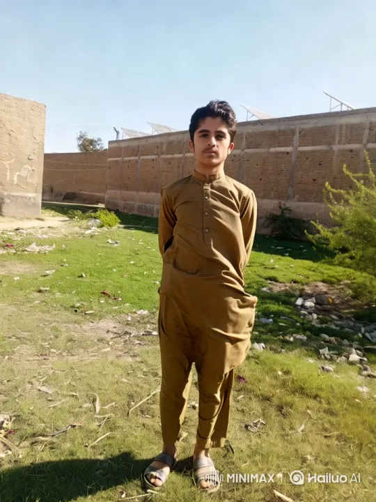 Young Boy in Traditional Attire: Cinematic Camera Movements – AI Generated Video | Hailuo AI
