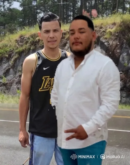 Two Men Embrace Tenderly Amidst Scenic Forest – AI Generated Video | Hailuo AI