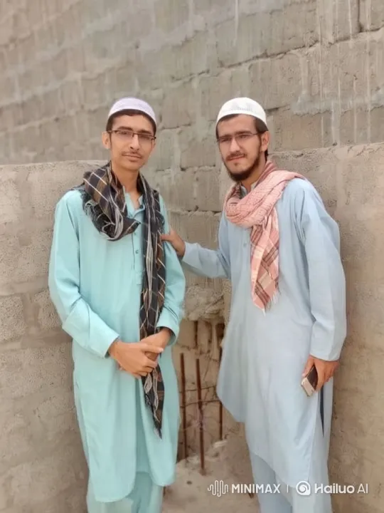Two Men in Traditional Attire at Construction Site – AI Generated Video | Hailuo AI