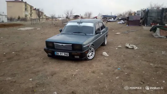 Sleek Car Drifts Dramatically Across Barren Terrain – AI Generated Video | Hailuo AI