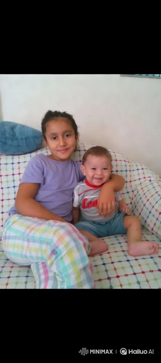 Sibling Bond in Cozy Indoor Setting – AI Generated Video | Hailuo AI