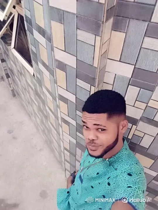 Man Interacts with Patterned Wall in Dynamic Scene – AI Generated Video | Hailuo AI