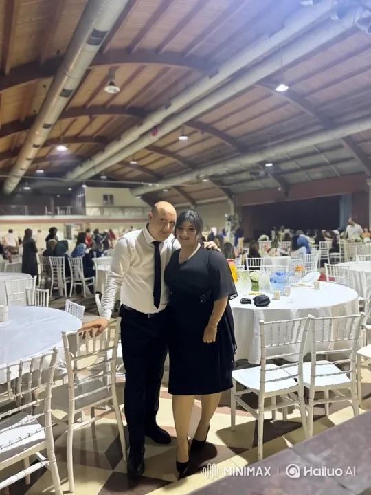 Couple Walking in Elegant Hall at Formal Event – AI Generated Video | Hailuo AI