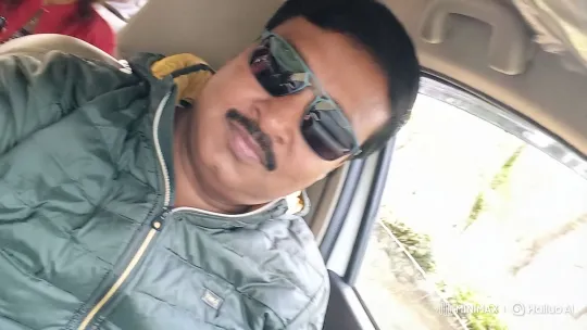 Calm Car Ride with Green Jacketed Person – AI Generated Video | Hailuo AI