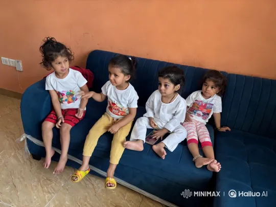 Children Engaged in Activities on a Blue Couch – AI Generated Video | Hailuo AI