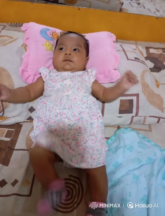 Cinematic Video of a Baby on a Colorful Bed – AI Generated Video | Hailuo AI