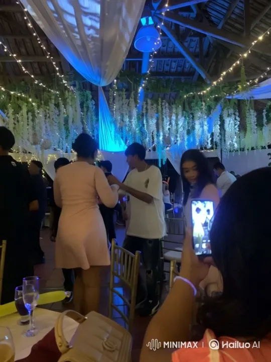 Joyful Couple Dancing at Elegant Party Under Lights – AI Generated Video | Hailuo AI