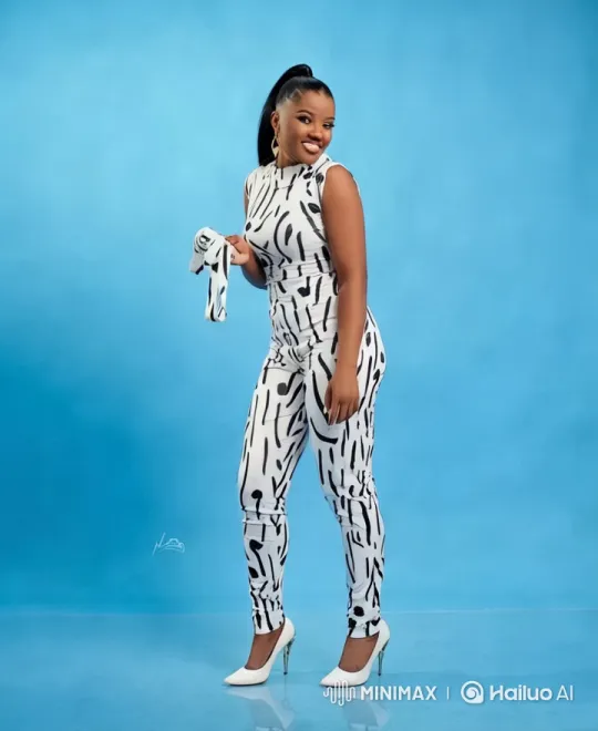 Ama's Journey: Style and Resilience Against a Blue Background – AI Generated Video | Hailuo AI