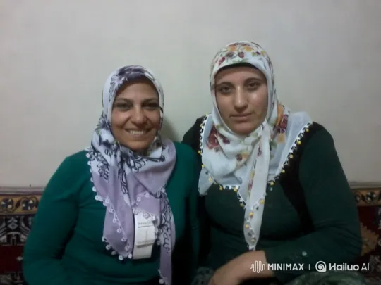 Two Women Embrace in Cultural Attire – AI Generated Video | Hailuo AI